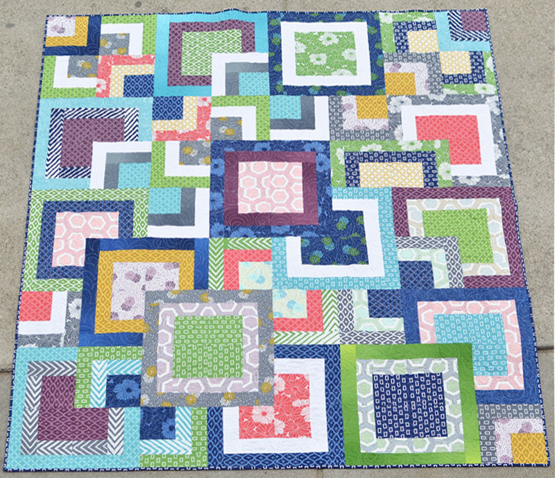 Simply Styled Stacked Square Quilt by Erica Jackman of Kitchen Table Quilting
