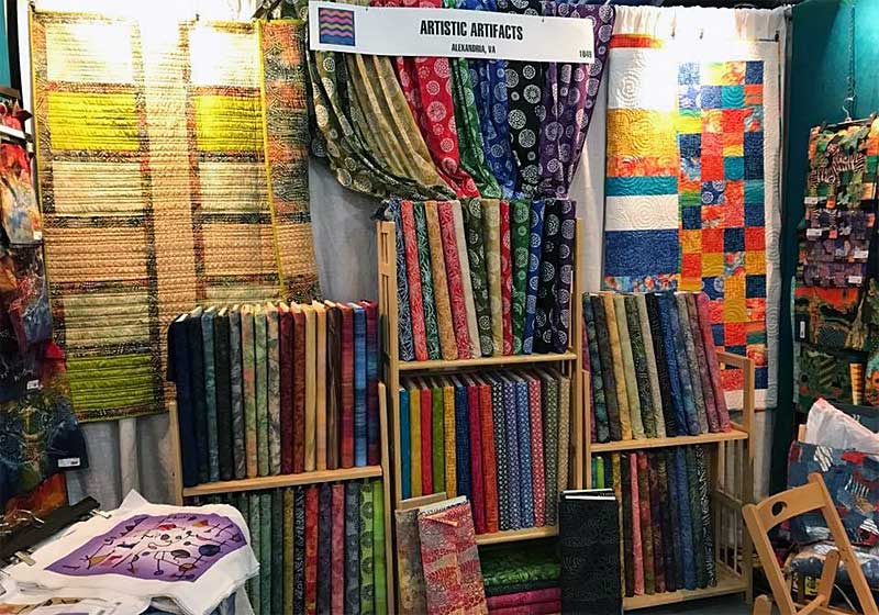 Artistic Artifacts/Batik Tambal booth at the 2016 Fall Quilt Market in Houston, Texas