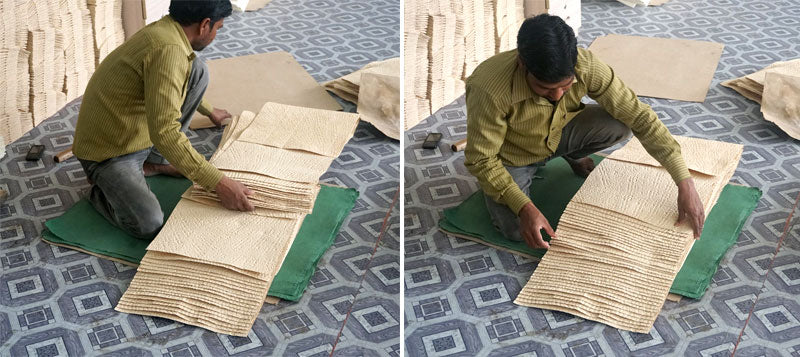 A busy factory worker at Salim's Paper 