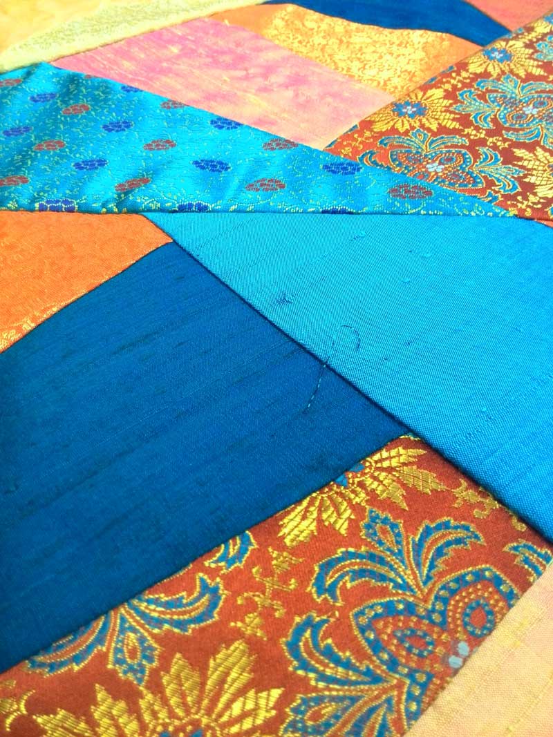 Crazy quilt table runner with silk fabrics from Treasures of the Gypsy