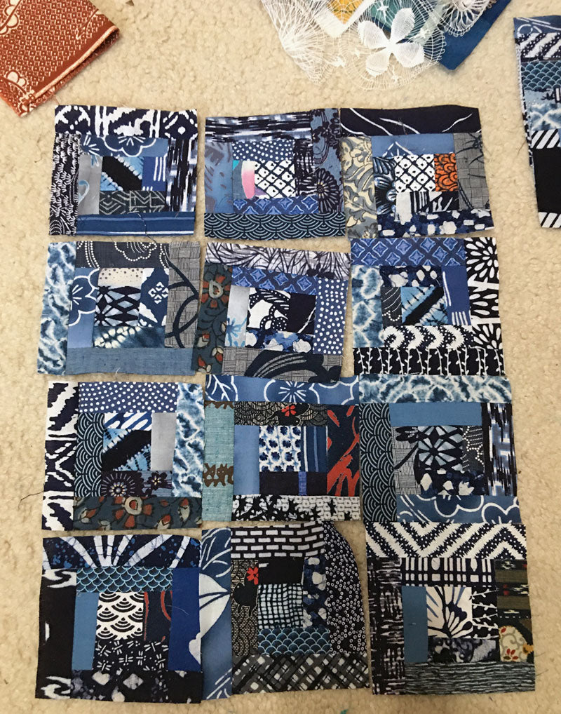 Log cabin quilt blocks from Japanese fabrics pieced by Judy Gula of Artistic Artifacts