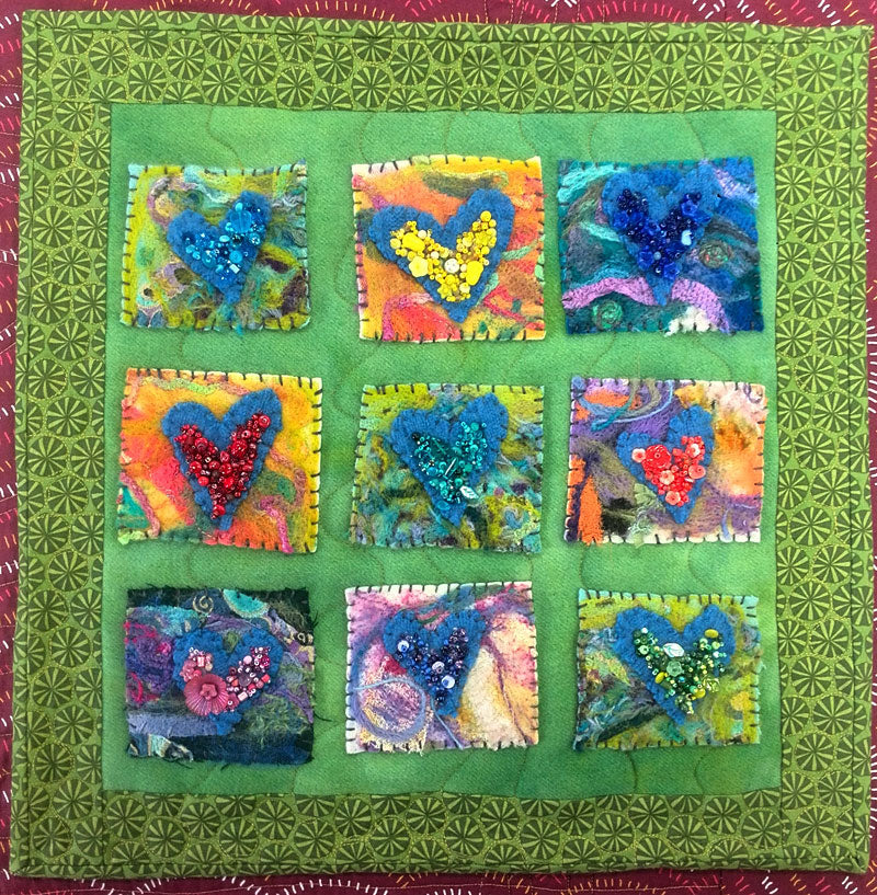Needlefelted and beaded nine-patch heart art quilt by Judy Gula of Artistic Artifacts