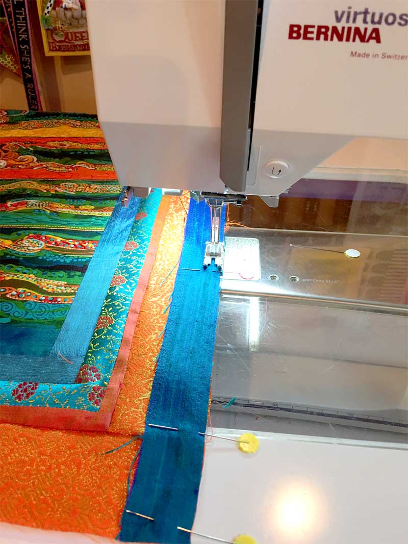 Adding silk borders to Mahyer batik panel quilt